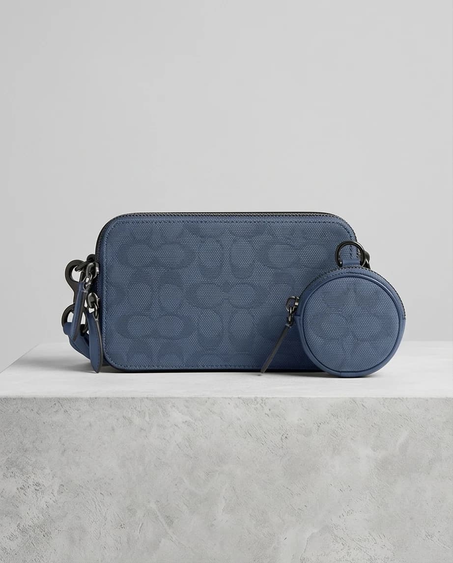 Niebieska torebka z etui coach